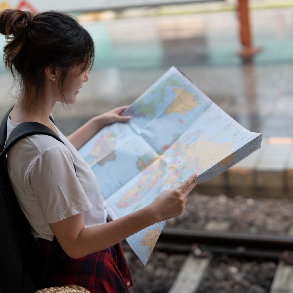 woman looking at map