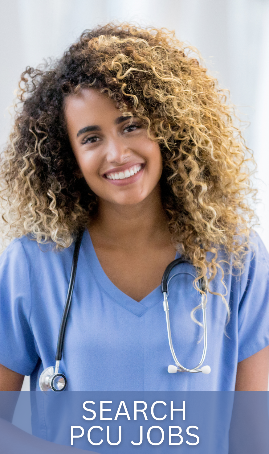PCU (Progressive Care Unit) nurse in light blue scrubs monitoring vital signs on medical equipment, demonstrating the specialized supervision required in intermediate care settings.